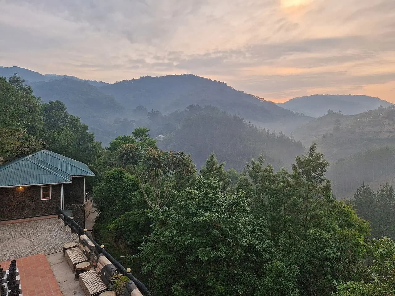 Lake Bunyonyi stay concept; illustrative Uganda lodging photograph, not this sample property